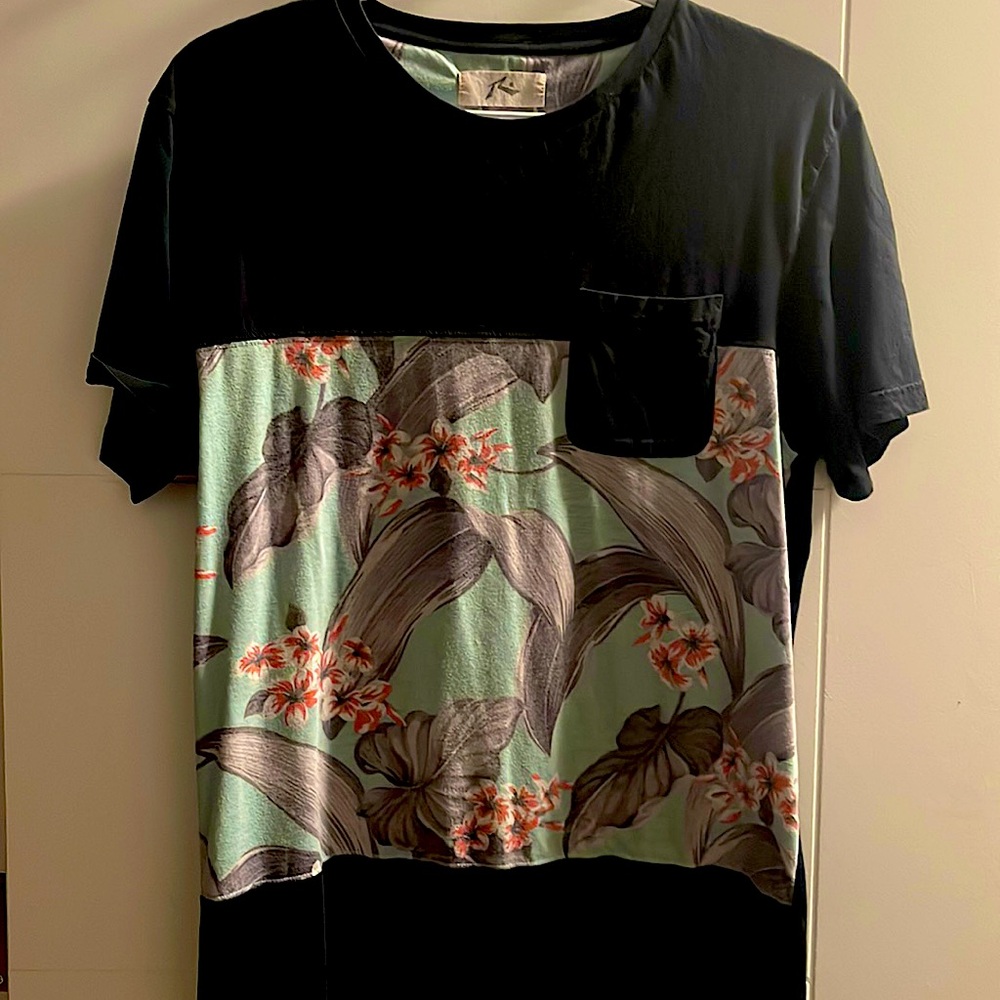 Black shirt with summer-like detail.